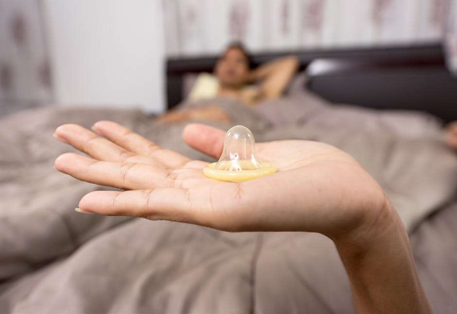 condom-in-hand-useable-with-alternatives-to-lube